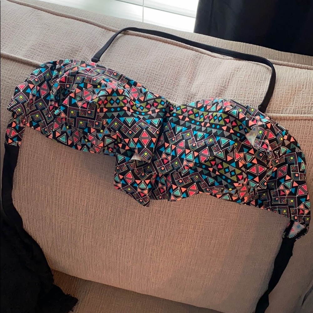 Never worn, swimming top.
